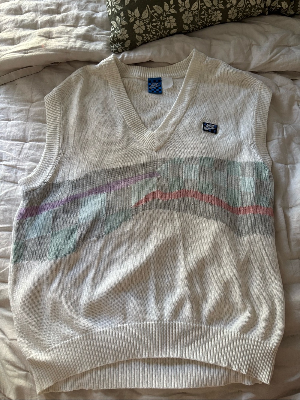 Vintage Nike Men's White Knit V-Neck Sweater Vest with Pastel Pattern